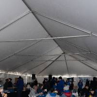 wide shot of alumni tent